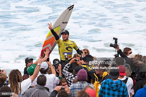 Joel Parkinson of Australia is chaired up the beach on the shoulders of his peers after surfing to victory in the Rip Curl Pro on April 17, 2009 in...