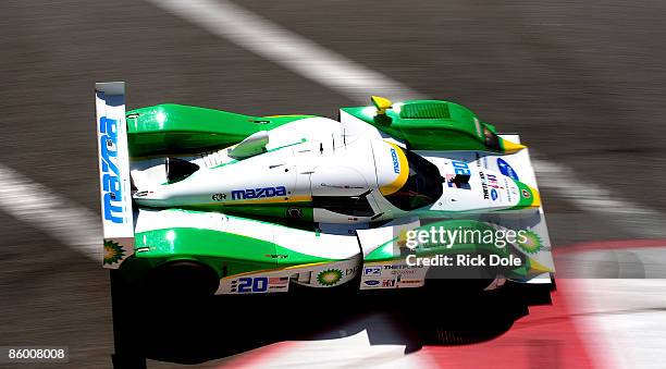 Butch Leitzinger and Marino Franchitti drive the Dyson Racing Lola B09 86 Mazda during practice for the Tequila Patron American Le Mans Series at...