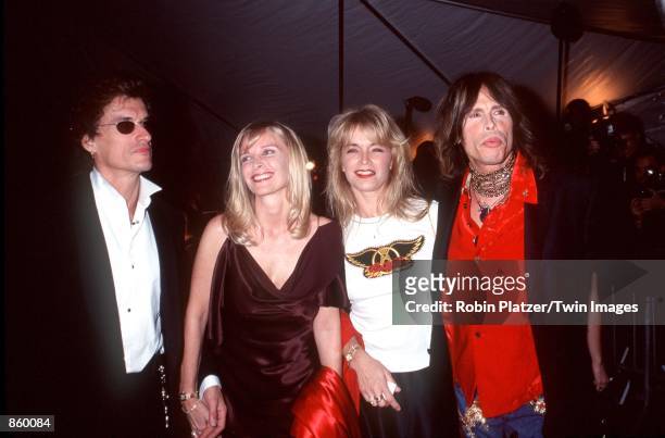 New York, NY. Couples, from left, Joe Perry & Billie Paulette Montgomery and Teresa Barrick & Steven Tyler of Aerosmith at the Metropolitan Museum of...