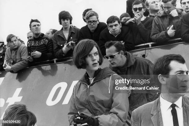 Helen Stewart, Grand Prix of Great Britain, Silverstone Circuit, July 10, 1965. Helen Stewart doing the timing in the BRM box, British Grand Prix...