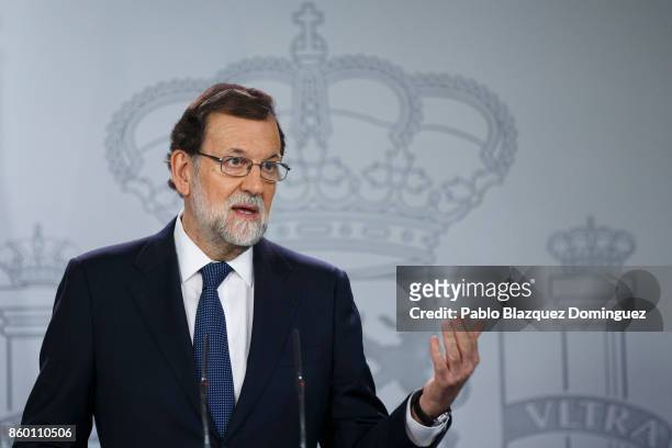 Spanish Prime Minister Mariano Rajoy speaks at a press conference following a crisis cabinet meeting over the Catalonian independence issue on...