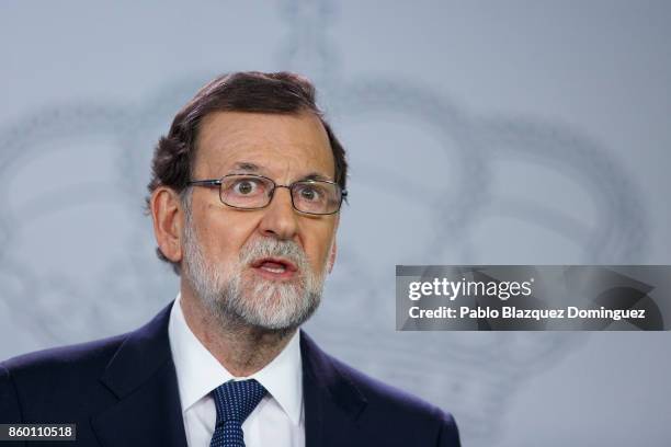 Spanish Prime Minister Mariano Rajoy speaks at a press conference following a crisis cabinet meeting over the Catalonian independence issue on...