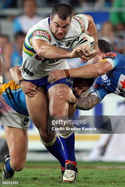 David Shillington of the Raiders attempts to break through the Titans defence during the round six NRL match between the Gold Coast Titans and the...