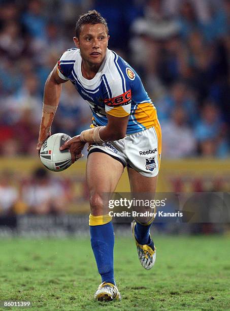 Scott Prince of the Titans looks to pass during the round six NRL match between the Gold Coast Titans and the Canberra Raiders at Skilled Stadium on...