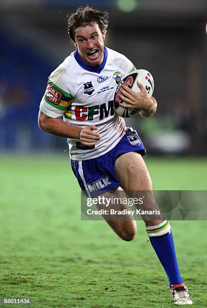 Marc Herbert of the Raiders runs with the ball during the round six NRL match between the Gold Coast Titans and the Canberra Raiders at Skilled...