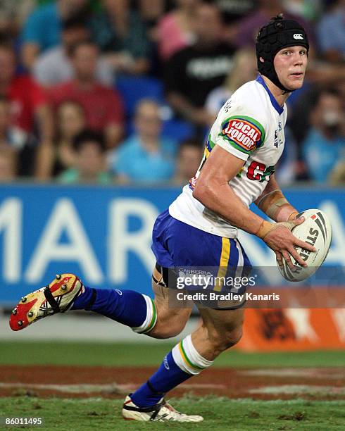 Josh Dugan of the Raiders looks to take on the Titans defence during the round six NRL match between the Gold Coast Titans and the Canberra Raiders...