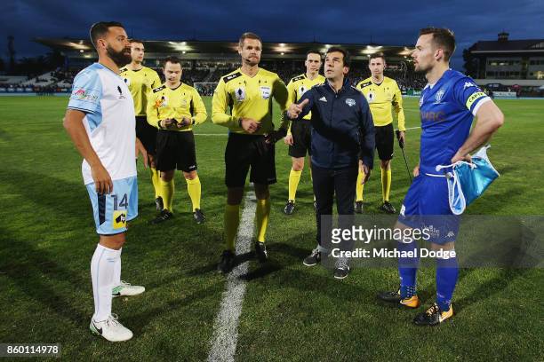Alex Brosque of Sydney FC and Matthew Foschini of South Melbourne look at the coin tossed during the FFA Cup Semi Final match between South Melbourne...