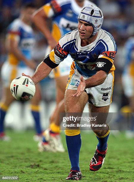 Nathan Friend of the Titans passes the ball during the round six NRL match between the Gold Coast Titans and the Canberra Raiders at Skilled Stadium...