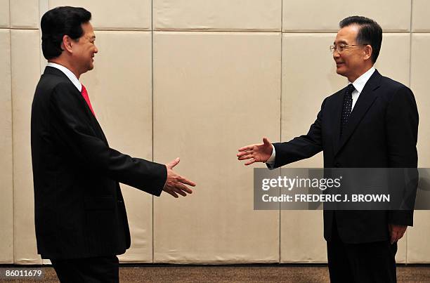 Visiting Prime Minister of Vietnam Nguyen Tan Dung meets with his Chinese counterpart Wen Jiabao in Sanya on April 17, 2009 for bi-lateral meetings...