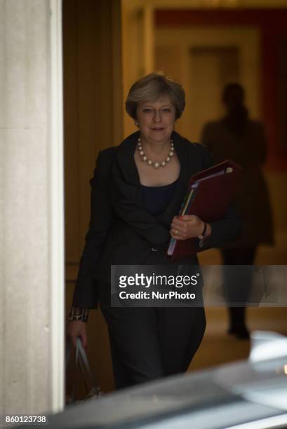 Britain's Prime minister, Theresa May leaves Downing Street to attend the weekly Question and Answer session at the Parliament, London on October 11,...