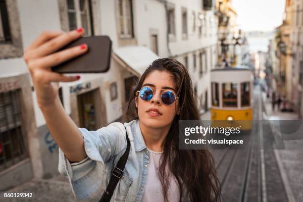 selfie with the old tram in lisbon - lisbon tram stock pictures, royalty-free photos & images