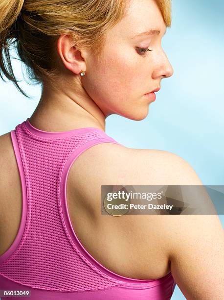 contraceptive patch on teenager. - contraceptive patch stock pictures, royalty-free photos & images