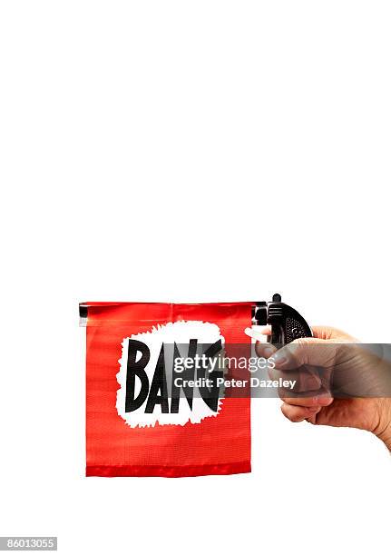 toy gun with flag coming out barrel reading bang - magnum fotografías e imágenes de stock