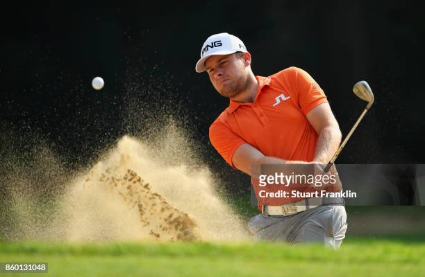 Tyrrell Hatton of England plays from a bunker during the Pro Am tournament ahead of the Italian Open at Golf Club Milano - Parco Reale di Monza on...