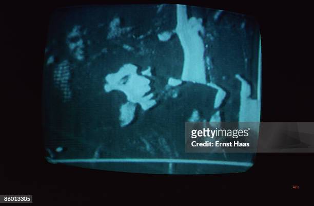 Television picture, broadcast in May 1977, of Palestinian-born assassin Sirhan Sirhan being arrested after his shooting of United States Senator...