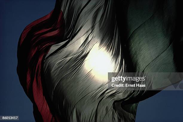 The sun shining through a silk banner, Japan, February 1983.