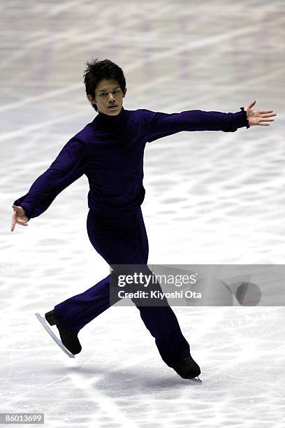 Takahiko Kozuka of Japan competes in the Men's Free Skating during the ISU World Team Trophy 2009 Day 2 at Yoyogi National Gymnasium on April 17,...