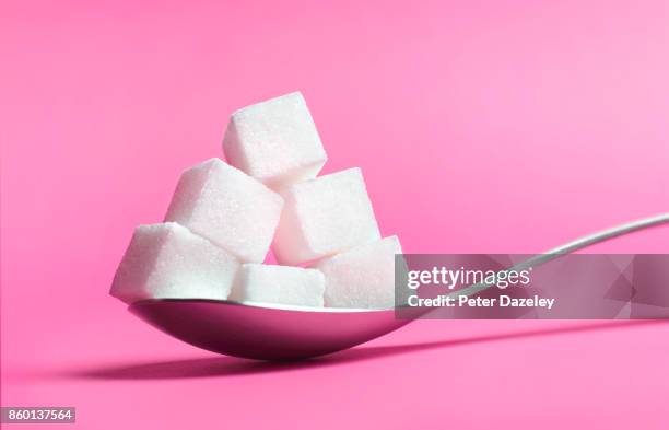 spoon full of sugar - teaspoon sugar stock pictures, royalty-free photos & images