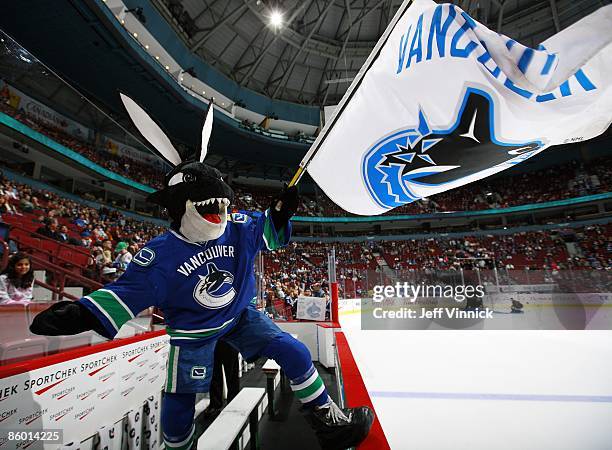 Vancouver Canucks mascot Fin wears his Easter bunny ears as he stands on the Canucks bench during the game against the Los Angeles Kings at General...