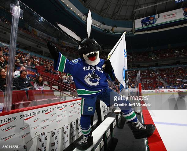 Vancouver Canucks mascot Fin wears his Easter bunny ears as he stands on the Canucks bench during the game against the Los Angeles Kings at General...