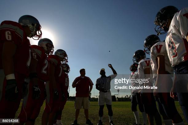 Players watch the coin at the begining of the varsity football game between the California School of the Deaf Riverside and Viewpoint on October 15,...