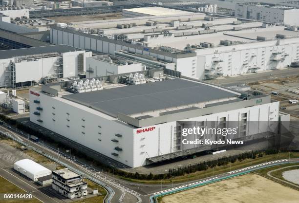 File photo taken March 31, 2016 shows a plant of electronics giant Sharp Corp. In Sakai, Osaka Prefecture. ==Kyodo