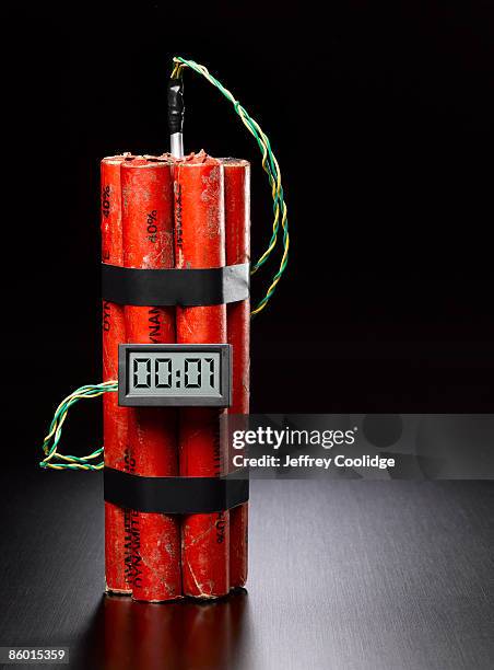 dynamite with digital timer - explosive imagens e fotografias de stock