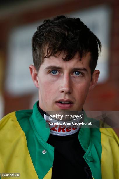 Jockey Bryan Cooper in the Ann & Alan Potts colours at Ludlow racecourse on October 11, 2017 in Ludlow, England.