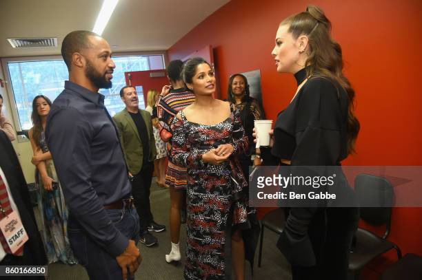 Justin Ervin, models Ashley Graham and Herieth Paul attend Glamour's "The Girl Project" on the International Day of the Girl on October 11, 2017 in...