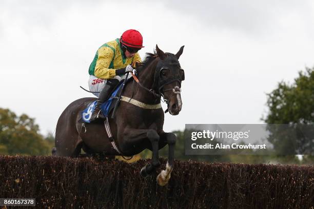 Jockey Bryan Cooper riding Exxaro in the Ann & Alan Potts colours at Ludlow racecourse on October 11, 2017 in Ludlow, England.