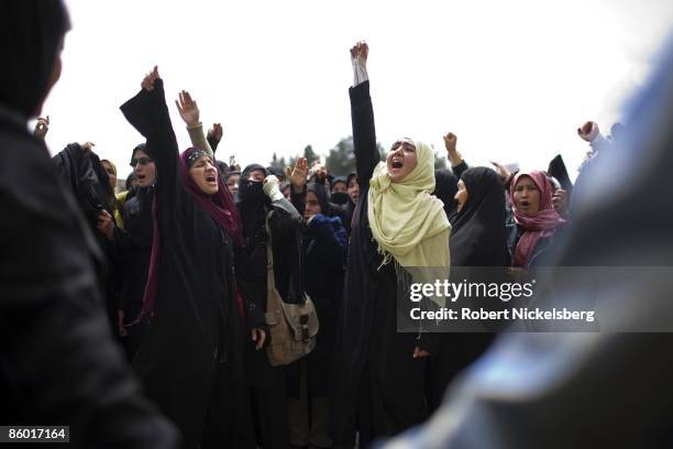 Group of Shia women supporting a new family law confront opponents of the law on April 15, 2009 in Kabul, Afghanistan. Opponents denounce the law as...
