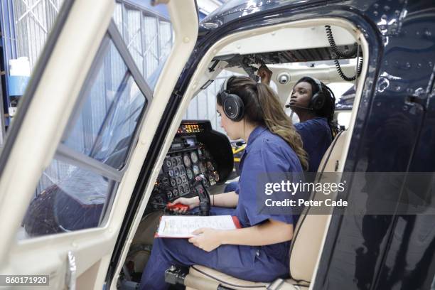 young female engineers working with helicopters - flight instruments stock pictures, royalty-free photos & images