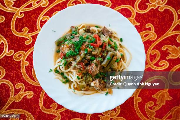 uyghur and dungan food: laghman noodles - kyrgyzstan stock pictures, royalty-free photos & images