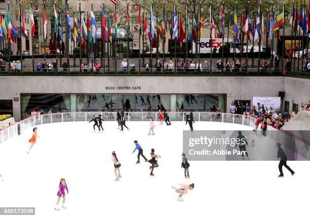 Olympic Gold Medalists Meryl Davis and Charlie White enjoy the season's first skate at The Rink at Rockefeller Center on October 11, 2017 in New York...