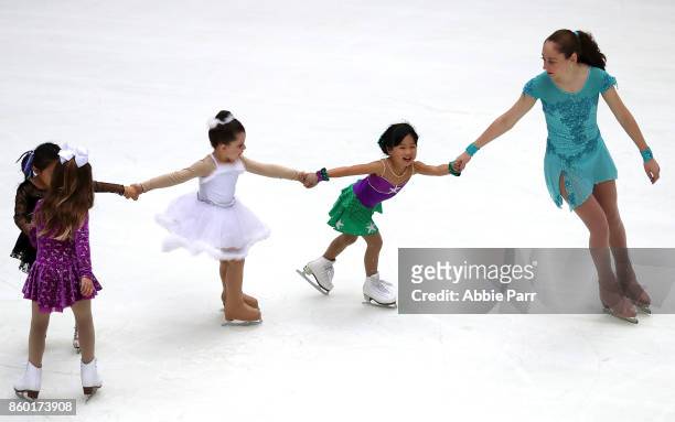 Young individuals enjoy the season's first skate at The Rink at Rockefeller Center on October 11, 2017 in New York City.