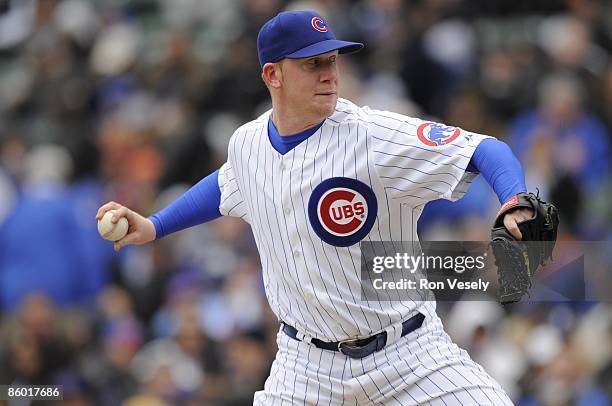 David Patton of the Chicago Cubs pitches against the Colorado Rockies on April 15, 2009 at Wrigley Field in Chicago, Illinois. All players wore...