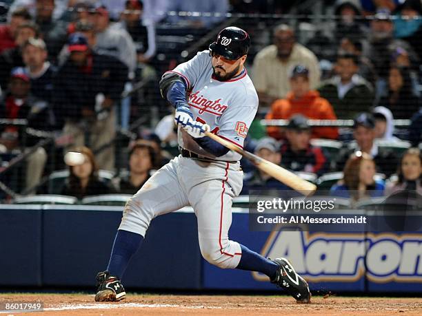 Infielder Nick Johnson of the Washington Nationals bats against the Atlanta Braves on April 11, 2009 at Turner Field in Atlanta, Georgia.