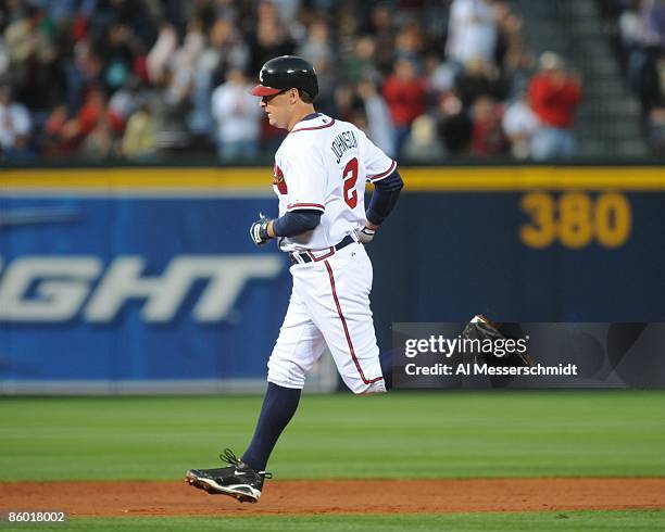 Infielder Kelly Johnson of the Atlanta Braves rounds the bases against the Washington Nationals April 11, 2009 in Atlanta, Georgia.