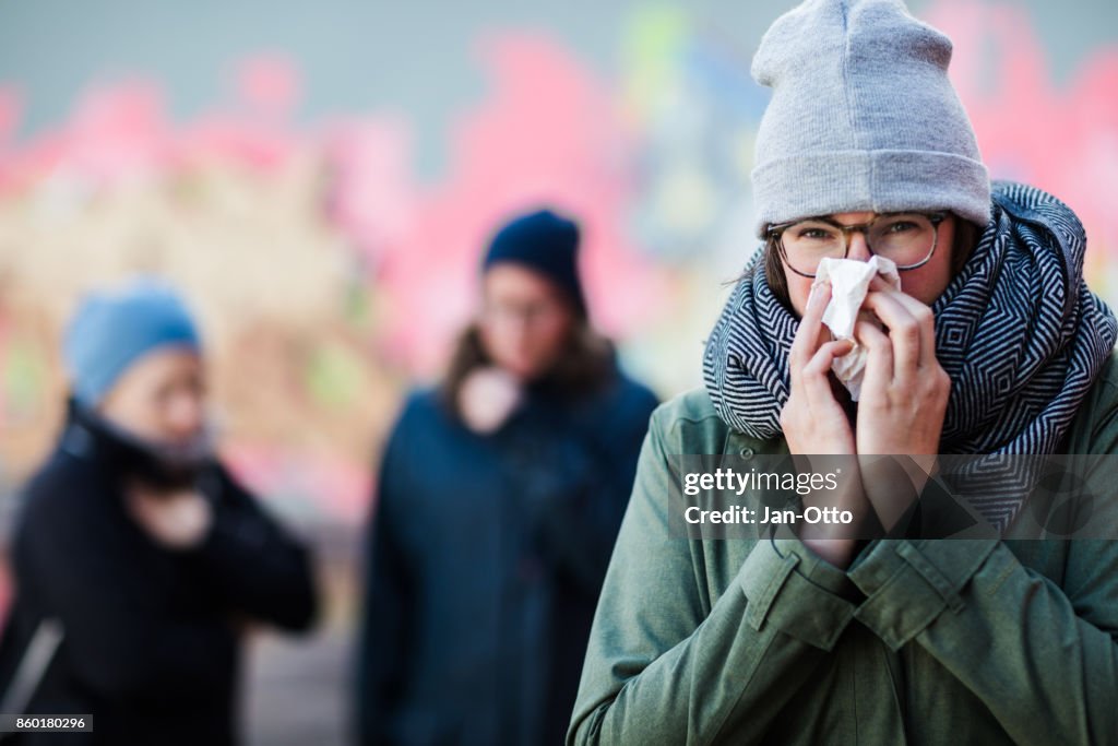 Young women having a cold