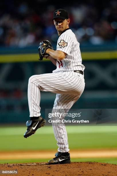 Roy Oswalt of the Houston Astros pitches against the Chicago Cubs during the Opening Day game on April 6, 2009 at Minute Maid Park in Houston, Texas.