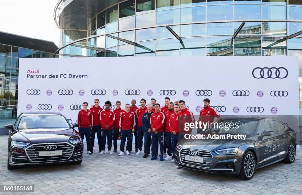 Jupp Heynckes head coach and Thomas Mueller of Bayern Muenchen and team mates pose for a photo during the FC Bayern Muenchen New Car Handover at the...