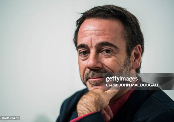 French author Michel Bussi takes part in a discussion the Frankfurt Book Fair 2017 in Frankfurt am Main, central Germany, on October 11, 2017. The...