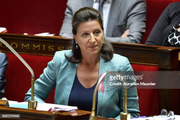 French Health and Solidarity Minister Agnes Buzyn reacts as Ministers answer deputies during the weekly questions to the government at the Assemblee...