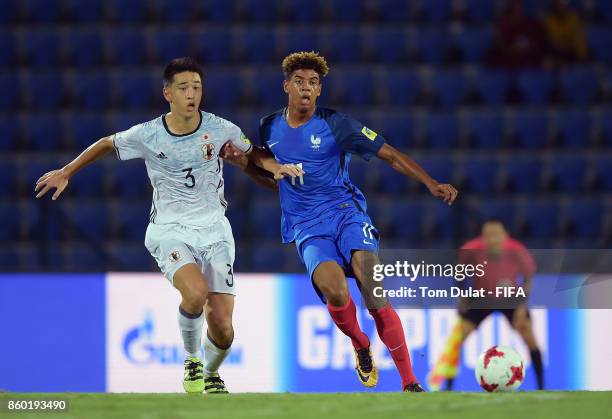 Willem Geubbels of France and Yuki Kobayashi of Japan in action during the FIFA U-17 World Cup India 2017 group E match between France and Japan at...