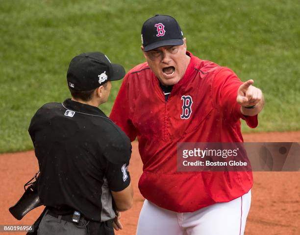 Boston Red Sox manager John Farrell, right, after he was ejected from the game by the home plate umpire Mark Wegner. The Boston Red Sox hosted the...