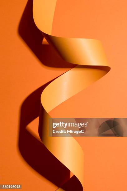 flexibility of abstract paper stripe - wallpaper roll stockfoto's en -beelden