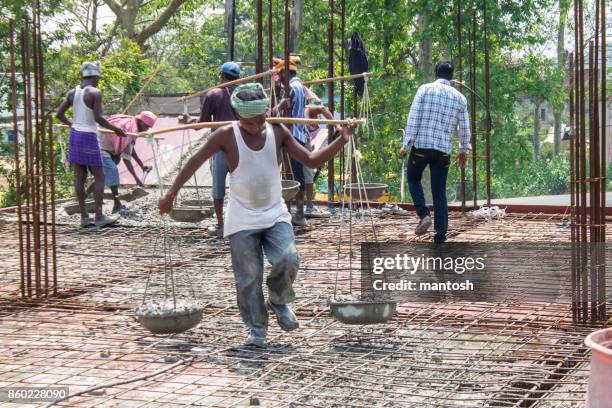 rural construction workers on site - maintenance worker stock pictures, royalty-free photos & images