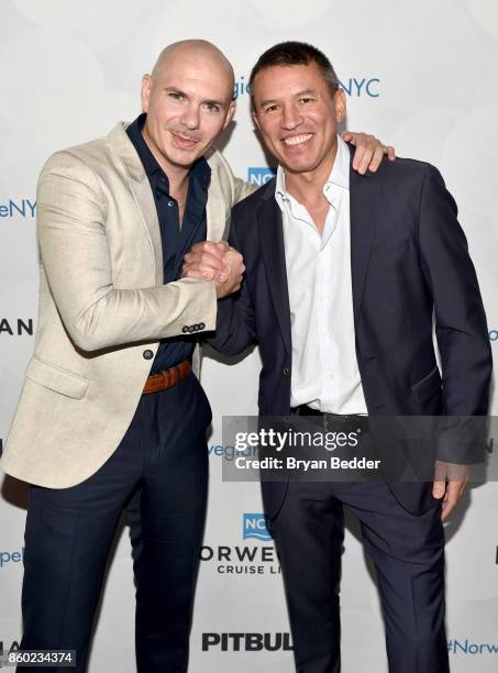 Godfather Pitbull and President and CEO of Norwegian Cruise Line Andy Stuart attend Norwegian Escape heads to NYC event with at PHD at the Dream...