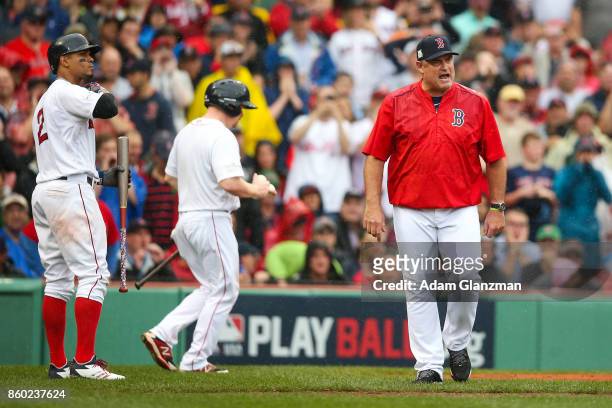 Manager John Farrell of the Boston Red Sox continues to argue after being ejected by home plate umpire Mark Wegner in the second inning of Game 4 of...