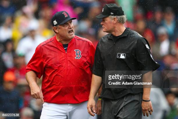 Manager John Farrell of the Boston Red Sox argues with first base umpire Mike Everitt after being ejected by home plate umpire Mark Wegner in the...